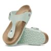 Gizeh con Big Buckle, remaches y logotipo textil